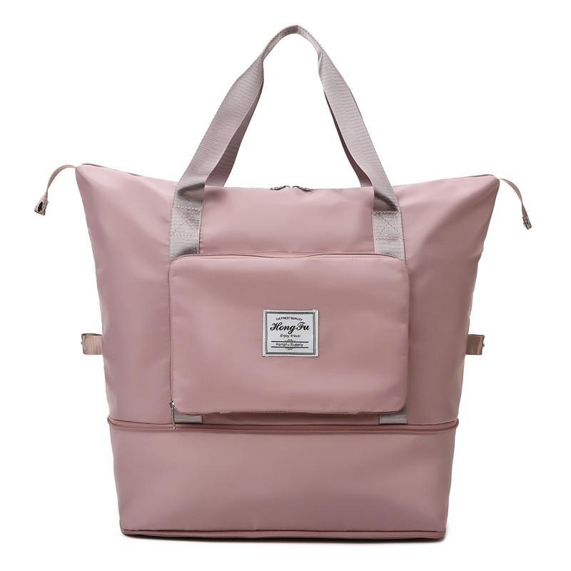 Sac à dos rose multifonctionnel avec poche avant zippée, poignées robustes et design moderne. Idéal pour voyage, école ou usage quotidien.