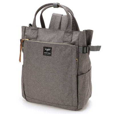 Sac à dos Anello gris, design moderne avec poignées, poches latérales et fermeture éclair. Idéal pour le quotidien et les voyages.