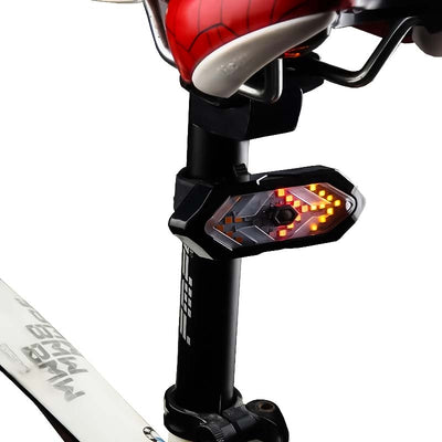 Tige de selle de vélo avec feu arrière LED clignotant en forme de flèche, sécurité cycliste, accessoire vélo moderne, éclairage nocturne efficace.