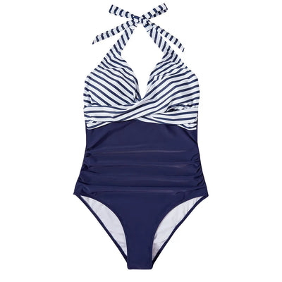 Maillot de bain une pièce bleu marine à rayures blanches, style dos nu, élégant et moderne, idéal pour la plage ou la piscine.