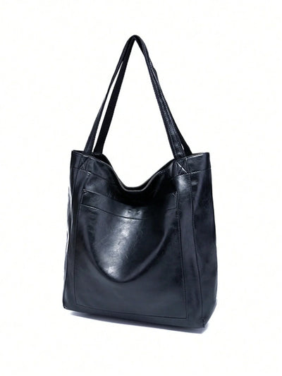 Sac cabas en cuir noir élégant avec anses longues, design moderne et spacieux, idéal pour le quotidien et le bureau. Accessoire mode tendance.