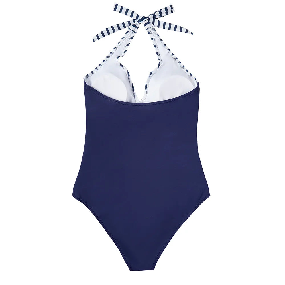 Maillot de bain une pièce bleu marine avec bretelles rayées blanches et bleues, style dos nu, élégant et tendance pour plage et piscine.