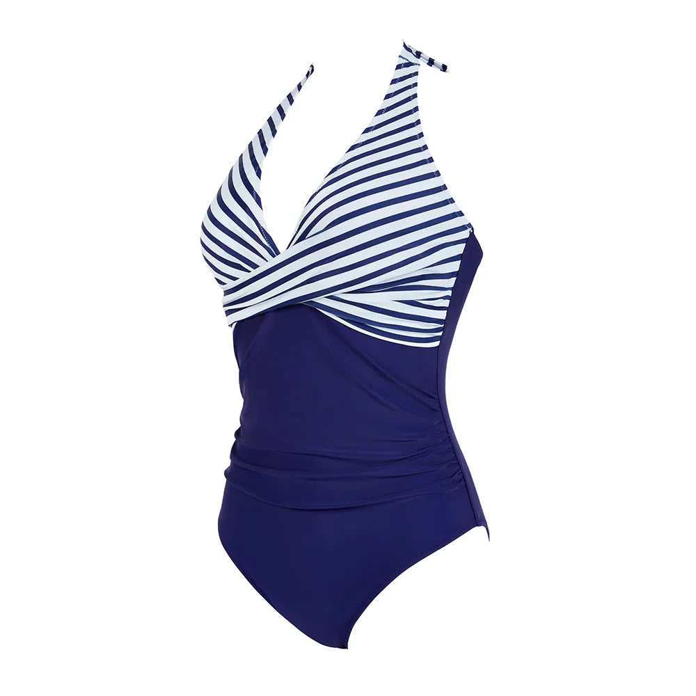 Maillot de bain une pièce bleu marine à rayures blanches, style dos nu, élégant et moderne, idéal pour la plage et la piscine.