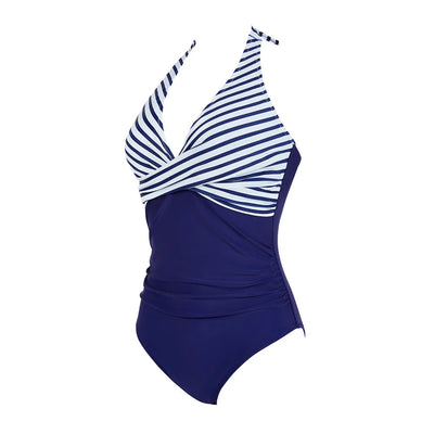 Maillot de bain une pièce bleu marine à rayures blanches, style dos nu, élégant et moderne, idéal pour la plage et la piscine.