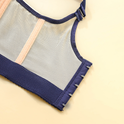 Soutien-gorge de sport bleu et beige, dos en maille respirante, agrafes réglables, lingerie féminine confortable, mode fitness.