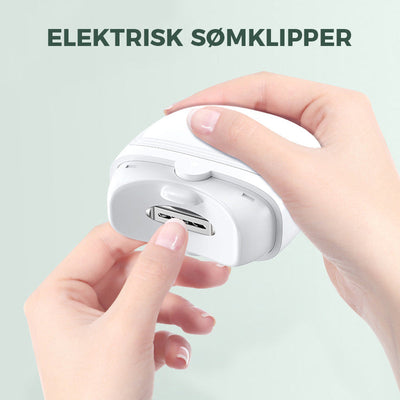 Coupe-ongles électrique blanc, ergonomique, tenu par des mains. Idéal pour manucure précise et rapide. Accessoire soin des ongles moderne.