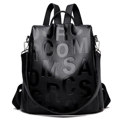 Sac à dos en cuir noir avec lettres en relief, design moderne et élégant, idéal pour la mode urbaine et le voyage. Accessoire tendance et pratique.