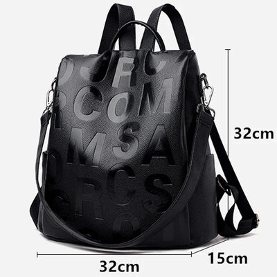 Sac à dos en cuir noir avec lettres en relief, dimensions 32x32x15 cm, design moderne et élégant, idéal pour la mode urbaine et le quotidien.