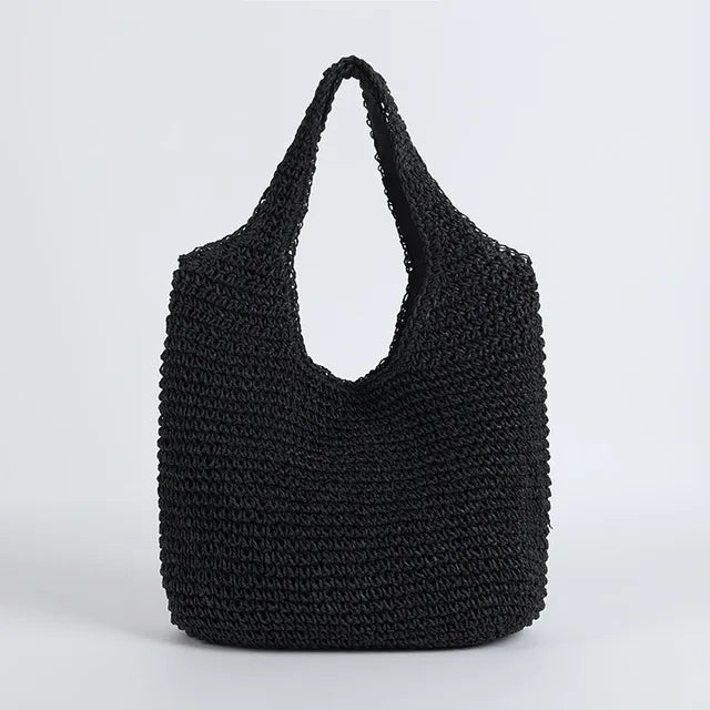 Sac à main noir en crochet, design moderne et élégant, parfait pour un style décontracté. Accessoire tendance pour femme, idéal pour l'été.