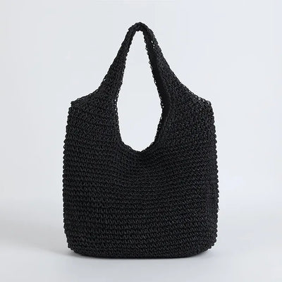 Sac à main noir en crochet, design moderne et élégant, parfait pour un style décontracté. Accessoire tendance pour femme, idéal pour l'été.