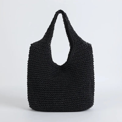 Sac cabas noir en crochet, design élégant et moderne, idéal pour le shopping ou la plage. Accessoire tendance, mode durable et pratique.