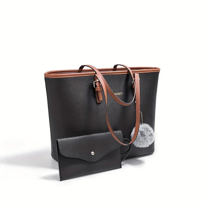 Sac à main noir élégant avec pompon gris, anses marron, accompagné d'une pochette assortie. Accessoire mode femme chic et tendance.