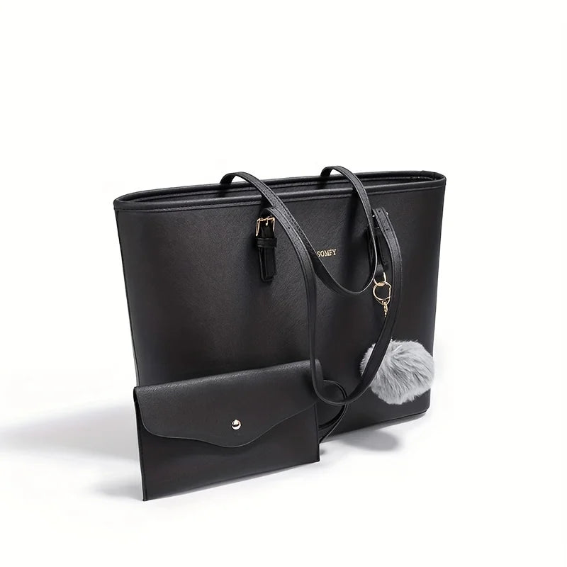 Sac à main noir élégant avec pochette assortie, pompon gris, design moderne, cuir synthétique, idéal pour femmes, mode, accessoires tendance.