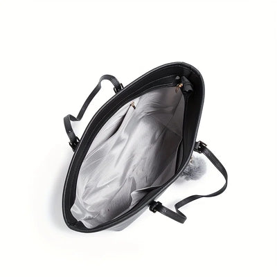 Sac à main noir ouvert avec intérieur gris, poignées élégantes, idéal pour femme moderne. Accessoire mode, tendance, pratique et spacieux.