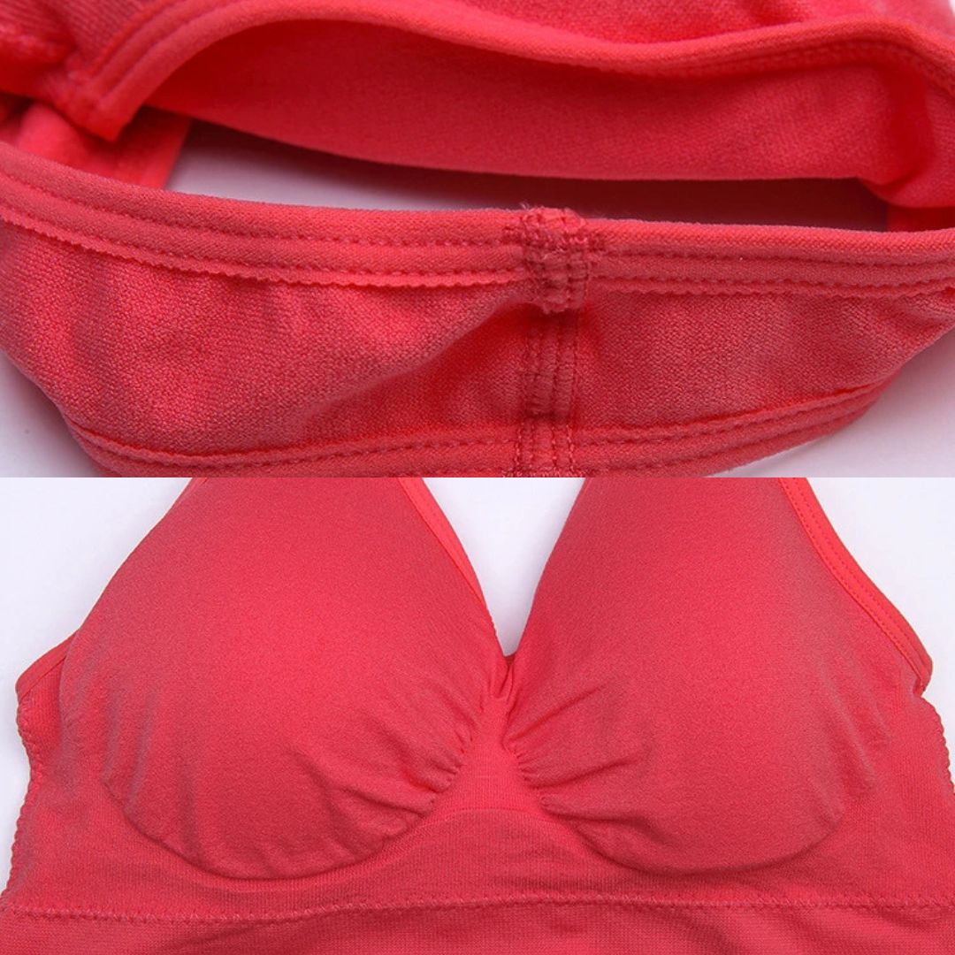 Soutien-gorge de sport rose corail, sans coutures, avec bonnets rembourrés et bande élastique, idéal pour fitness et confort quotidien.