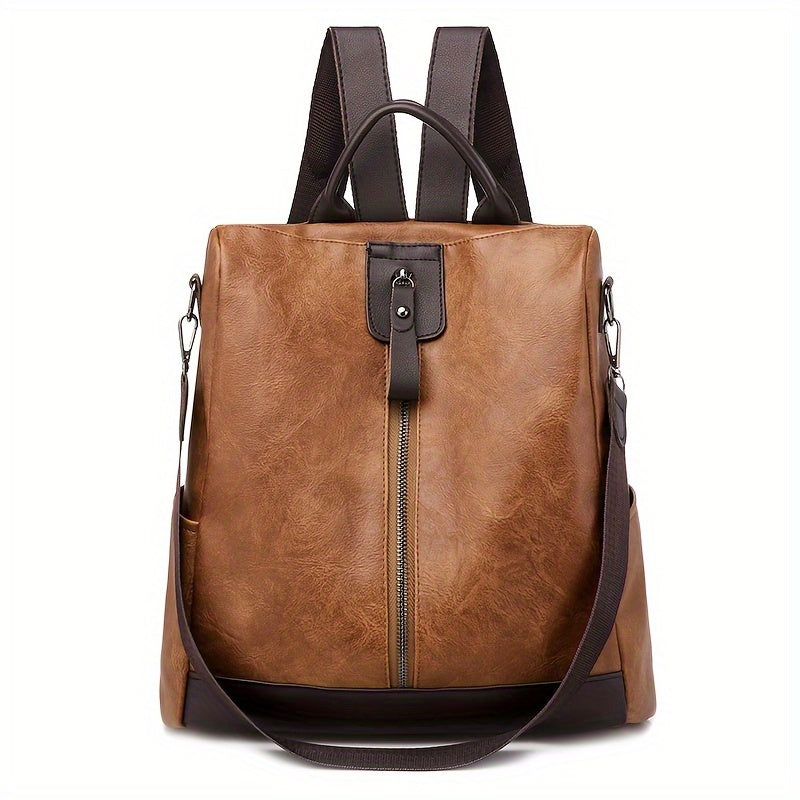 Sac à dos en cuir marron avec bretelles ajustables, fermeture éclair centrale et poche avant. Élégant et pratique pour le quotidien.