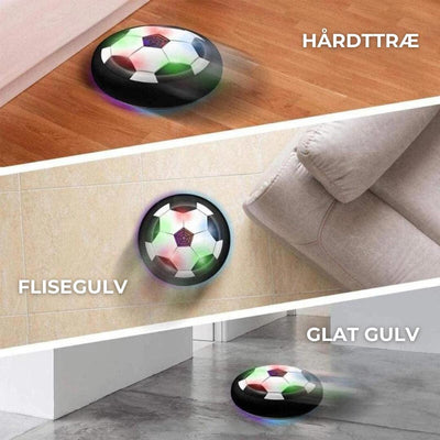 Disque volant lumineux en forme de ballon de football sur sol en bois, carrelage et sol lisse. Jouet interactif pour enfants, intérieur.