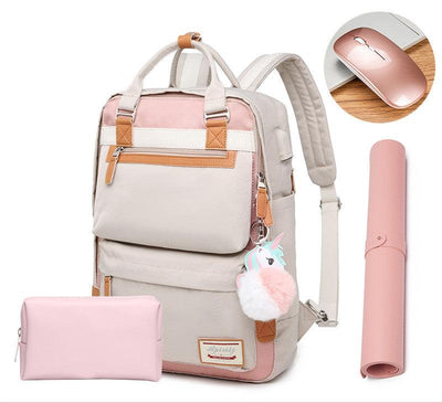 Sac à dos beige et rose avec porte-clés licorne, pochette assortie, tapis de souris rose et souris sans fil. Accessoires élégants pour étudiants.