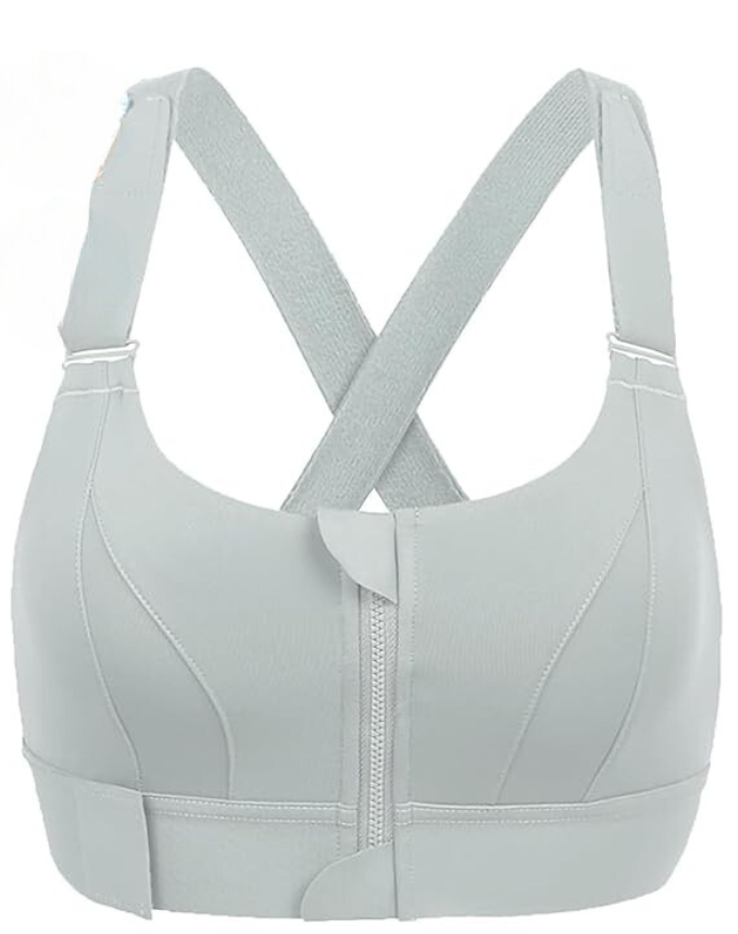 Soutien-gorge de sport gris clair avec fermeture éclair frontale, bretelles croisées, sans armature, idéal pour fitness et yoga.