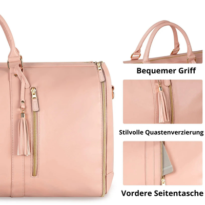 Sac à main rose élégant avec poignée confortable, fermeture éclair dorée, décoration à pompons, poche latérale avant. Accessoire mode femme.