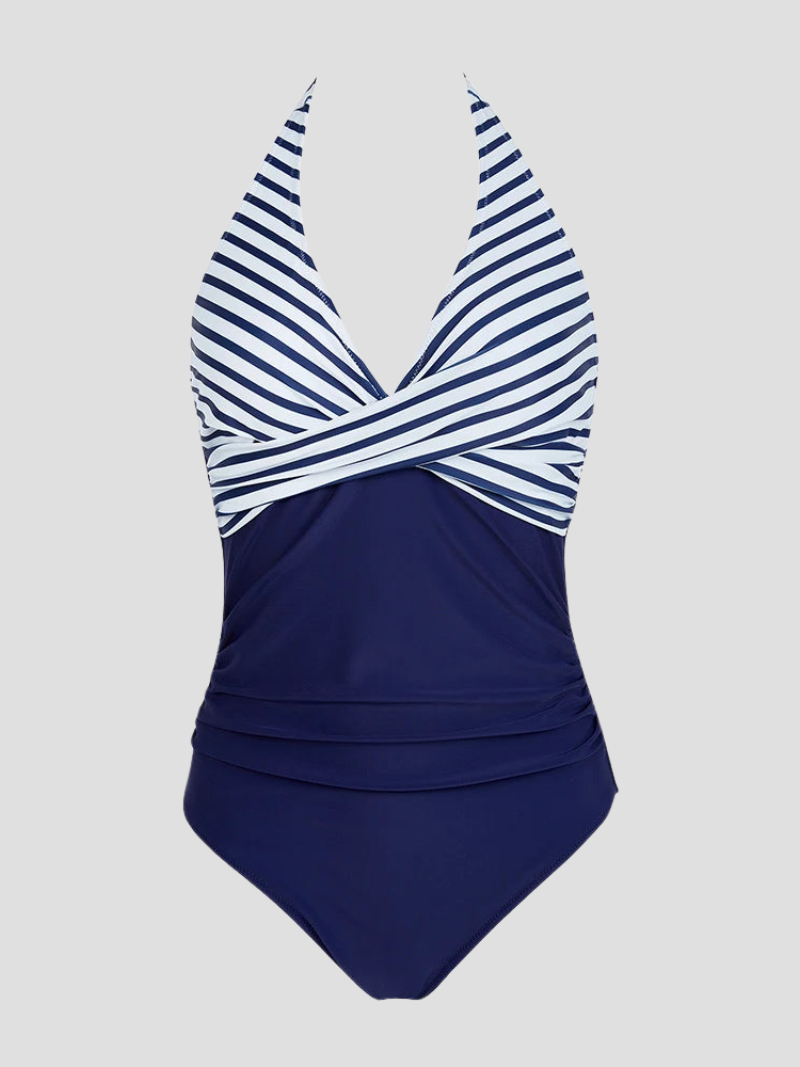 Maillot de bain une pièce bleu marine à rayures blanches, col en V, style croisé, élégant et moderne, idéal pour la plage et la piscine.