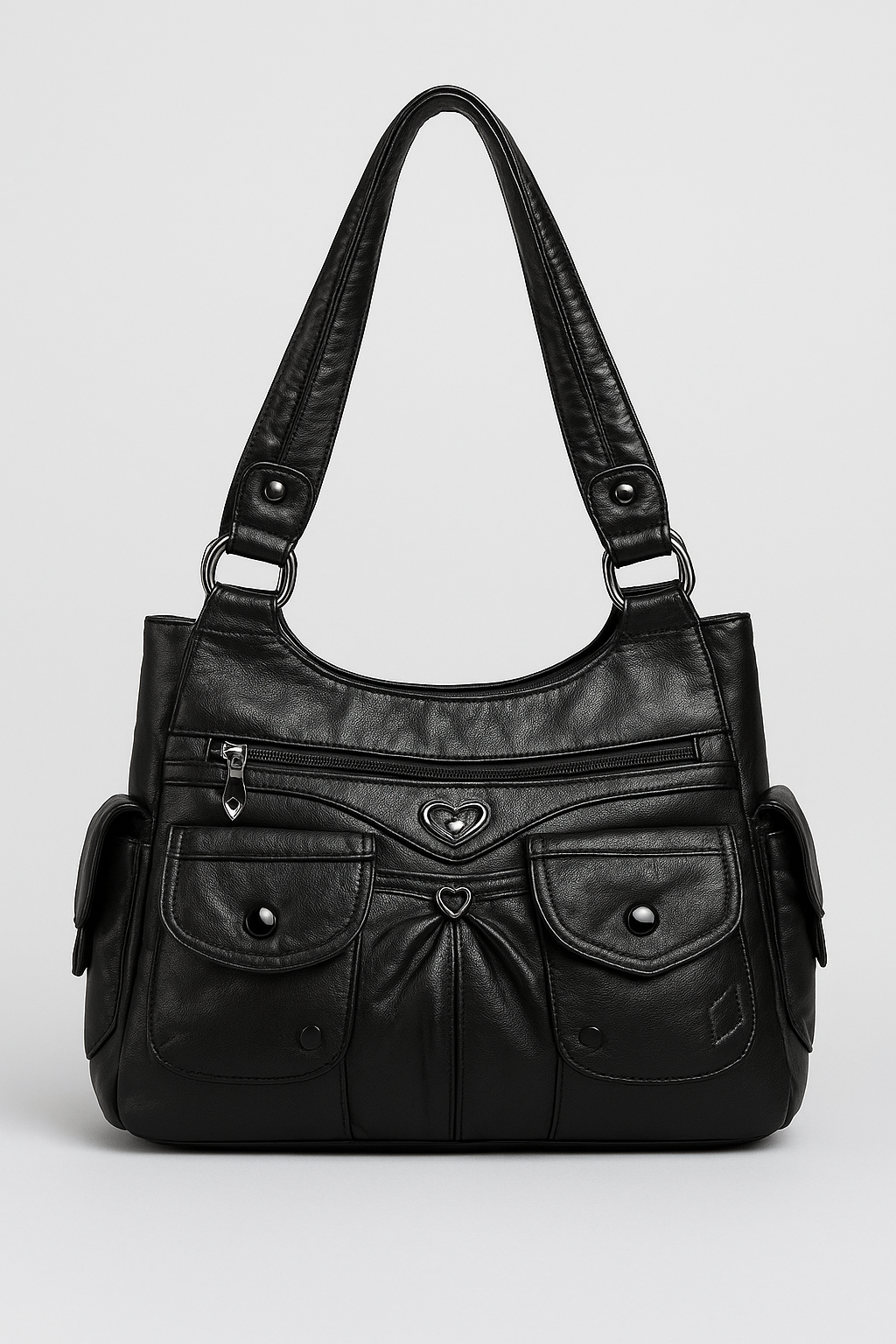 Sac à main noir en cuir avec poches avant, fermetures éclair et détails en forme de cœur. Élégant et pratique pour un usage quotidien.