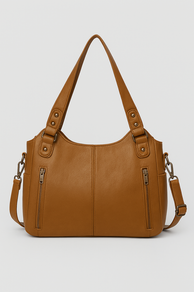Sac à main en cuir marron avec bandoulière amovible, deux poches zippées à l'avant, idéal pour un style élégant et pratique.