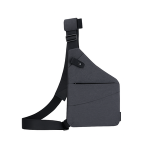 Sac bandoulière ergonomique gris foncé, design moderne, avec poche zippée et sangle ajustable. Accessoire mode pratique et tendance.
