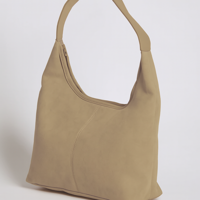 Sac à main beige en cuir, design minimaliste, anse unique, fond blanc. Accessoire mode élégant pour femme, tendance et chic.