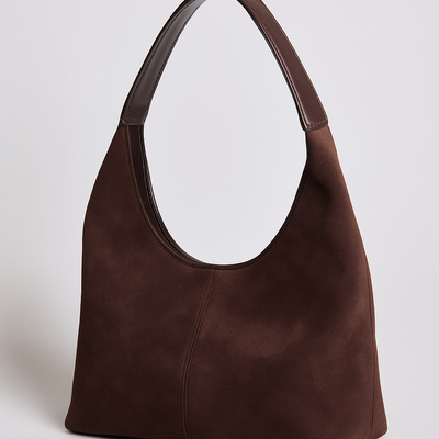 Sac à main en cuir marron foncé avec anse large, design élégant et moderne, idéal pour la mode féminine. Accessoire tendance et chic.