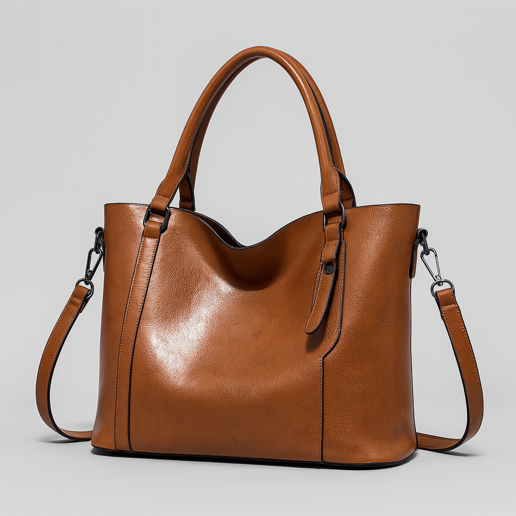Sac à main en cuir marron élégant avec bandoulière amovible, design moderne et minimaliste, idéal pour la mode féminine et les accessoires tendance.