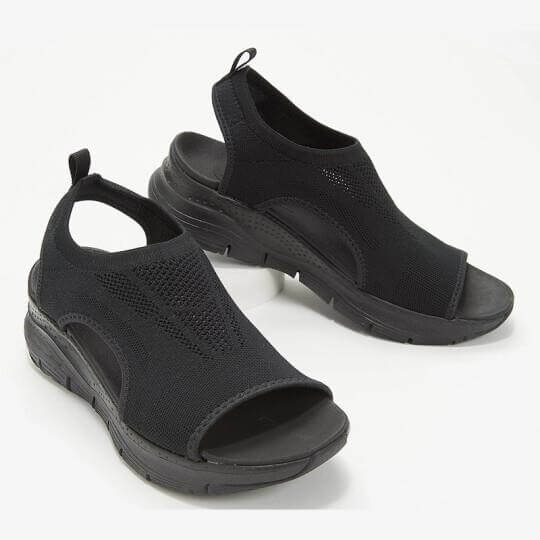 Sandales noires en maille respirante avec semelle épaisse, design moderne et confortable, idéales pour l'été. Chaussures légères et stylées.