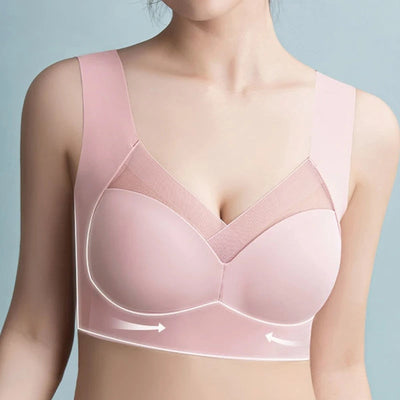 Soutien-gorge rose sans couture pour femme, design confortable avec bretelles larges et tissu respirant, idéal pour un maintien optimal.