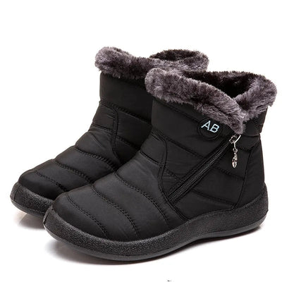 Botines negros de mujer forrados en polar, cómodos y casuales.