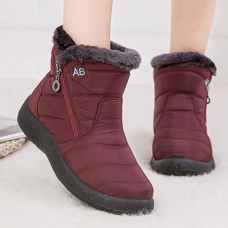 Botines negros de mujer forrados en polar, cómodos y casuales.