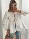 Blouse chic à manches bouffantes et devant cravate pour un style sans effort
