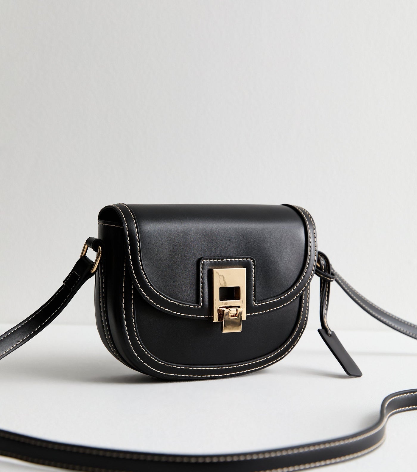 Black women's crossbody bag with flap