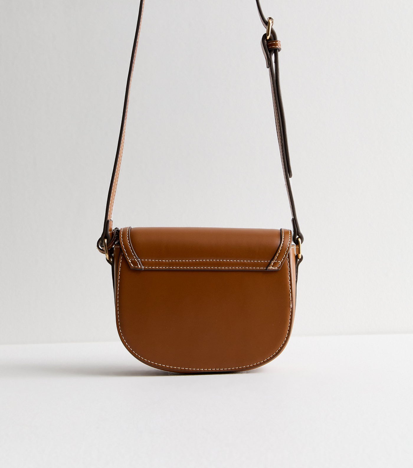 Brown women's crossbody bag with flap