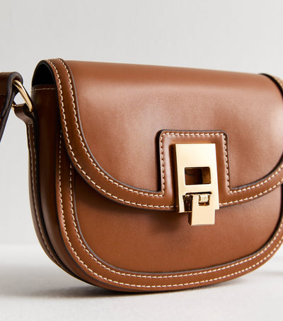 Brown women's crossbody bag with flap