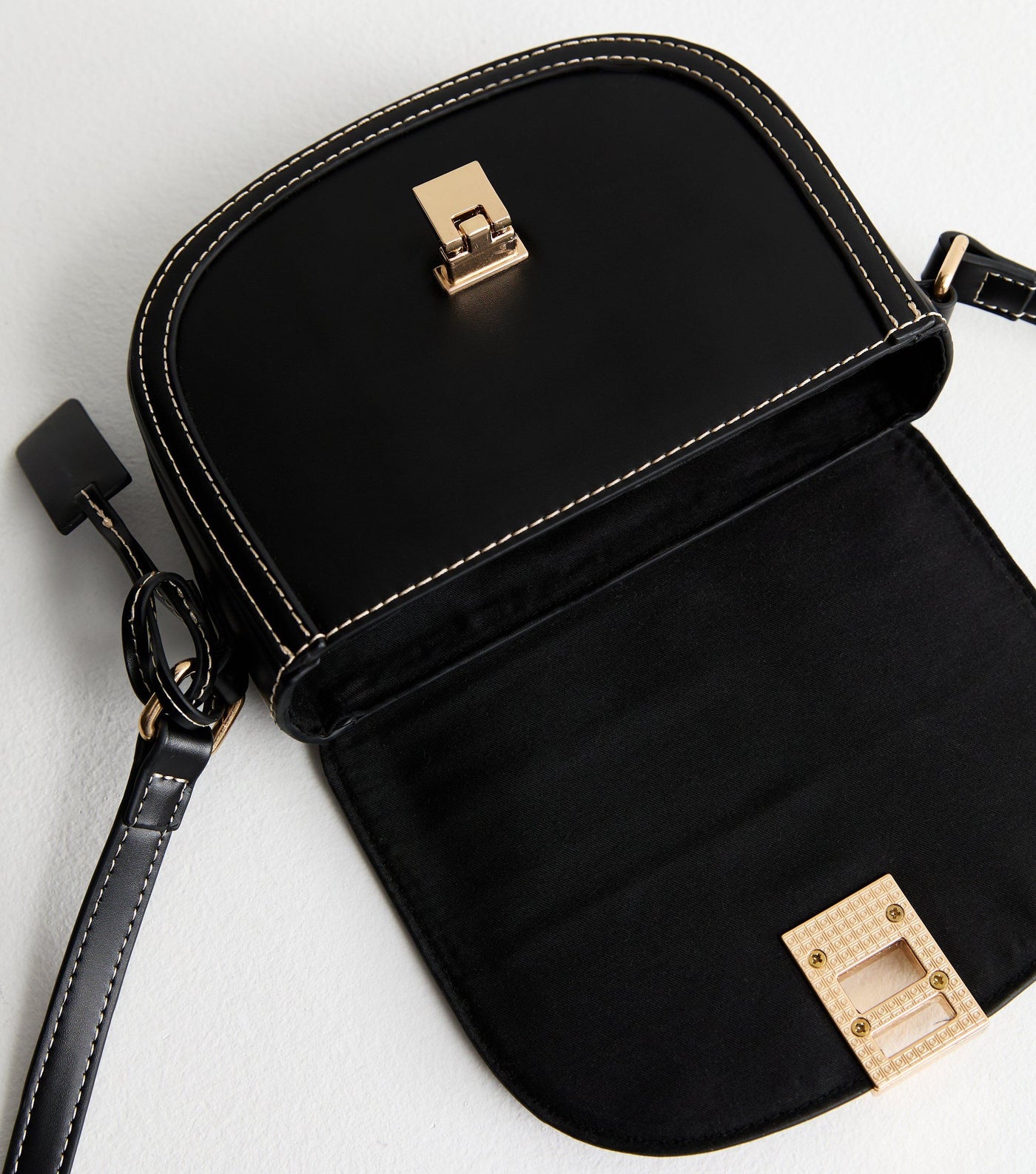 Black women's crossbody bag with flap