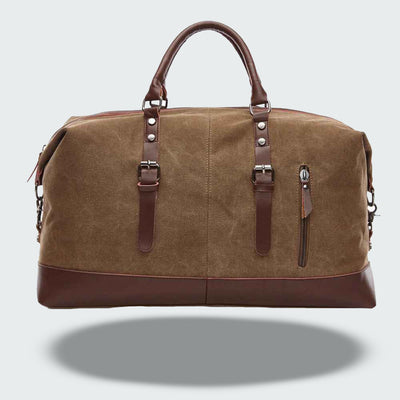 Sac de voyage en toile marron avec poignées en cuir, fermeture éclair latérale, design élégant et pratique. Accessoire mode homme et femme.