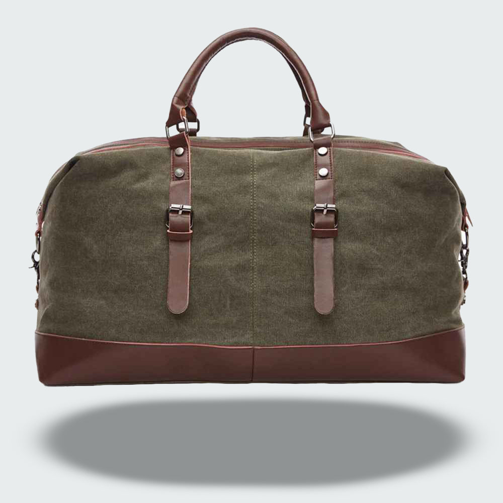 Sac de voyage en toile verte et cuir marron, avec poignées robustes et bandoulière amovible. Idéal pour week-end, style vintage élégant.
