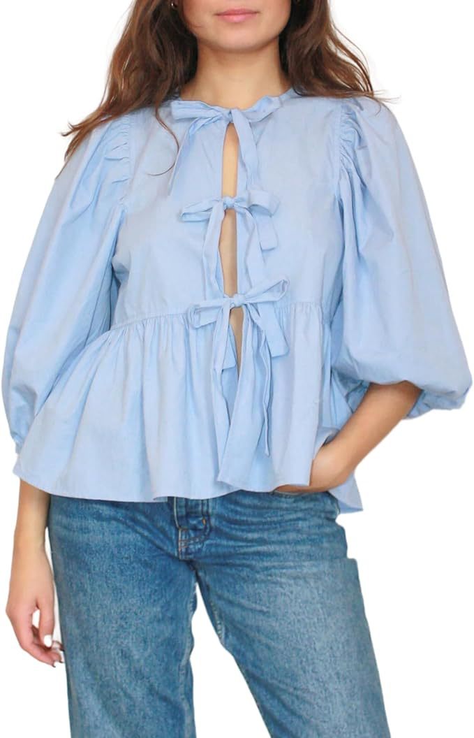 Blouse chic à manches bouffantes et devant cravate pour un style sans effort