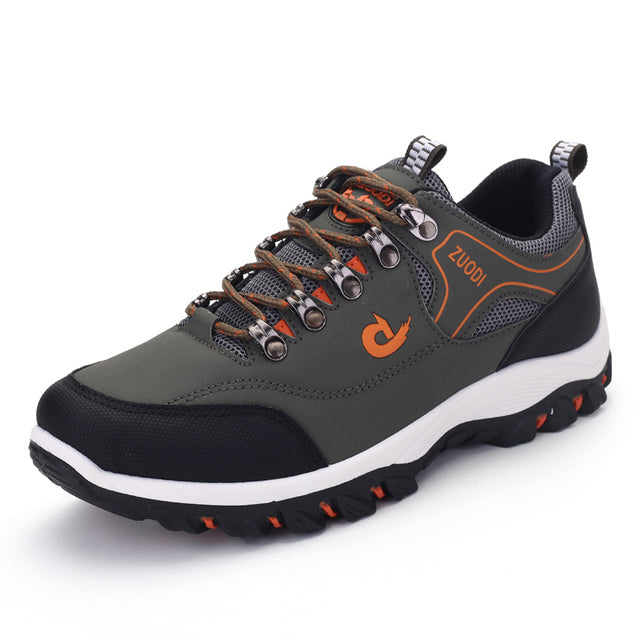 Chaussure de randonnée imperméable pour homme, couleur gris et noir, semelle antidérapante, lacets robustes, idéale pour trekking et activités extérieures.