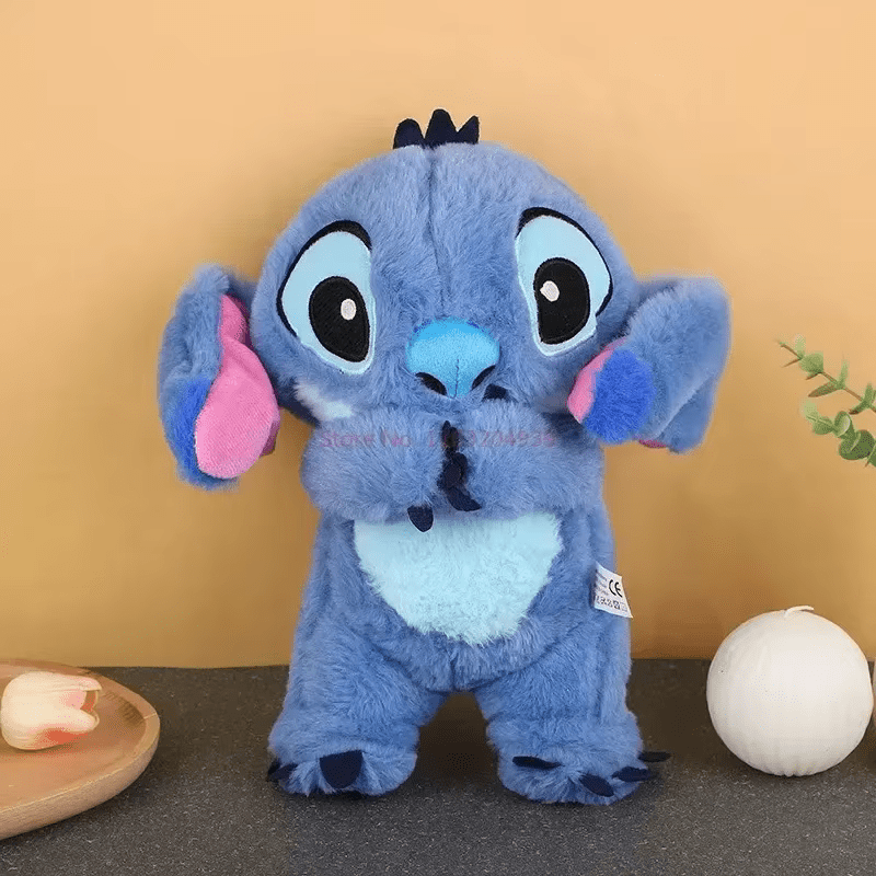 Jouet en peluche avec musique apaisante et mouvements respiratoires