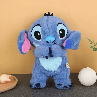 Jouet en peluche avec musique apaisante et mouvements respiratoires