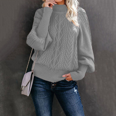 Pull en grosse maille pour femme avec col haut et manches volumineuses
