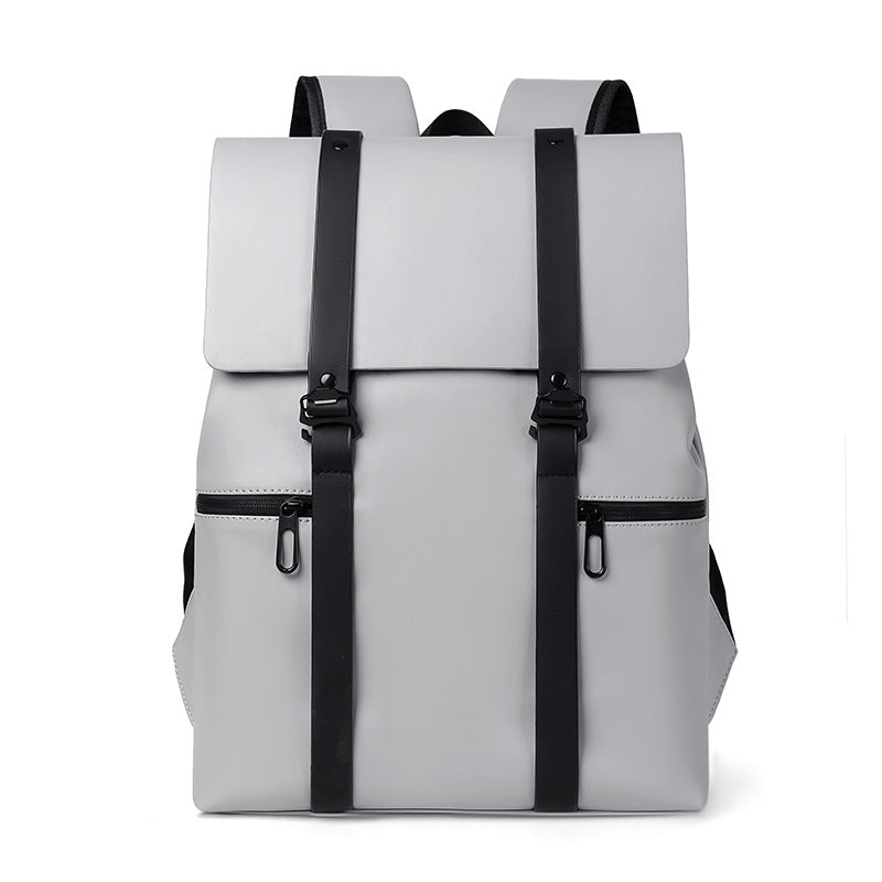 Sac à dos gris moderne avec bretelles noires, poches zippées, design minimaliste. Idéal pour école, travail, voyage. Accessoire tendance et pratique.