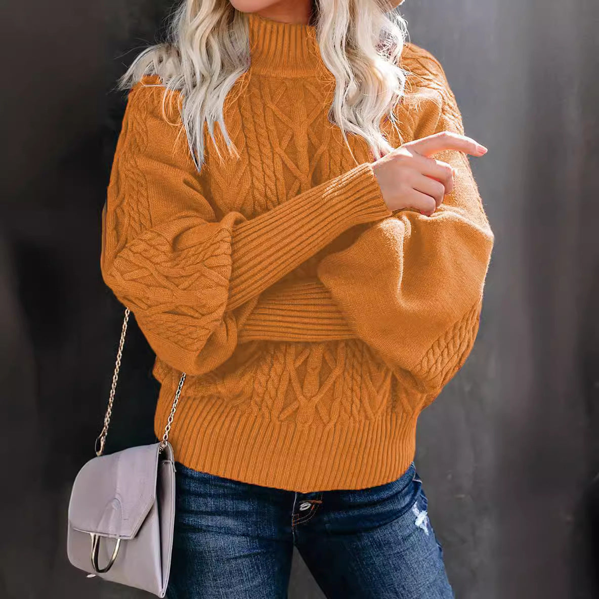 Pull en grosse maille pour femme avec col haut et manches volumineuses
