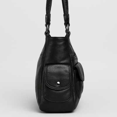 Sac à main en cuir noir avec poche avant, design élégant et moderne, idéal pour femmes, accessoire mode tendance, vue latérale.